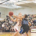Men’s Basketball: Senior Jon Yeazel (#23) charges forward during a recent game. The team currently holds a 4-1 record in the Great Lakes Intercollegiate Athletic Conference. Torch File Photo