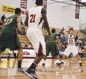 Game On: Senior Jon Yeazel (#23) prepares to make a pass during Friday’s game against Northern Michigan University. Yeazel helped spur the team to victory by scoring 10 points, one of four Bulldogs to score in the double digits. The team will play more home games this week vs. Hillsdale and Findlay. Photo By: Kristyn Sonnenberg | Photo Editor
