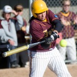 Grand Slam: Senior Rhea Flores, pitcher for the softball team, keeps her eyes on the ball at a recent game. Flores pitched a four hitter against West Georgia leading to a 4-3 victory. Photo courtesy of Ferris State Athletics