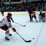 Topping It Off: Senior Blair Riley prepares for a shot against Western Michigan during Friday’s home game. This Saturday marked the end of the team’s regular season as they head into the first-round Central Collegiate Hockey Association Playoffs. Photo By: Kate Dupon | Photographer