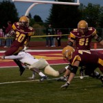 Winning Streak: Tyler Thomas, sophomore, attemps to leap over the Tiffin defense during Saturday’s game. The Ferris State football team took down the Tiffin Dragons on Saturday, Sept. 25. This brings the Bulldog record to 3-1 for the 2010 season. Photo By: Kate Dupon | Photo Editor Winning Streak: Tyler Thomas, sophomore, attemps to leap over the Tiffin defense during Saturday’s game. The Ferris State football team took down the Tiffin Dragons on Saturday, Sept. 25. This brings the Bulldog record to 3-1 for the 2010 season. Photo By: Kate Dupon | Photo Editor