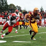 On a Roll: The Ferris State football team defeated Ohio Dominican on Saturday, Sept. 18 by a score of 34-28. Sophomore running back Skyler Stoker evades a Cardinal defender during the Bulldogs’ victory over Saginaw Valley State last week. Torch File Photo
