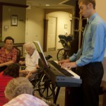Music to Elderly Ears: Ferris State student Jordan Scott has been playing piano for elderly Big Rapids citizens. Jordan performs a large range of music selections at several assisted living facilities. Photo By: Kate Dupon | Photo Editor