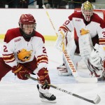 Victory at Home: Freshman Defenseman Scott Czarnowczan helps goalie Pat Nagle defend the net during the St. Lawrence game this weekend. The Bulldogs swept the home-opening series, bringing their 2010-11 record to 3-1. Photo By: Brock Copus | Photographer