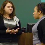 Student Discussions: Morgan Toms and Danielle Hoskey discuss controversial topics at the event “Free Speech, When It Goes Too Far.” Discussion topics were about anything from offensive imagery and bullying to the recent FSU T-shirts. Photo By: Angie Walukonis | Photographer