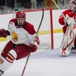 Sending Miami Home: Sophomore forward Kyle Bonis, below, lines up a shot and celebrates a goal against the No. 1 nationally-ranked Miami (Ohio) RedHawks, above. Ferris State defeated Miami Friday and Saturday games. The Bulldog victories improve the Bulldogs’ 2010-11 season record to 5-3-2 overall and 2-2-2-2 in conference play. Photos By: Brock Copus | Photographer