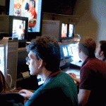 Lights, Camera, Action!: Students in the TV production class produce a live show from the control room by implementing transitions, switching between cameras and placing names of participants on the screen. Photo By: Kate Dupon | Photo Editor