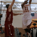 Going Up: Bulldog senior guard Darien Gay shoots a layup over a St. Joseph’s defender in a 66-55 victory over the Pumas on Nov. 15. Photo By: Kate Dupon | Photo Editor