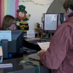 Students Affected: Tarin Hetherington talks with a student service representative about transcripts and payments. Pell Grants at Ferris State may be reduced by $845, causing many students to lose vital aid. Photo By: Kate Dupon | Photo Editor