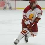 Award Finalists: Bulldog seniors Zach Redmond and Pat Nagle compete during a 2010-11 game. Both Redmond and Nagle were recognized as CCHA award finalists. Torch File Photo