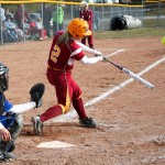 Bulldog Softball: Junior third baseman Makenzi Peterson, above, takes a swing during the April 8 game against Lake Superior State. Senior Lynsay Weaver, below, slides into home during the Bulldogs’ 4-0 victory over the Lakers. Photos By: Brock Copus | Photographer