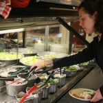 Eating Healthy: Liala Al-Shatel reaches for some healthy food options at Westview Dining Center. Students have a variety of healthy options available for them on campus. Photo By: Kate Dupon | Photo Editor