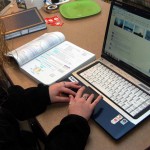 Becoming Distracted: Jenna Burg, junior in radiography, is distracted from studying by Facebook. Many students find themselves trying to avoid bad study habits including surfing the web. Photo By: Sam Lehnert | Ad Layout Assistant