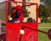 Dunked for a Cause: Student Ambassador Nicholas Campau particpated in the dunk tank which helped to raise money for the American Red Cross Disaster Relief Fund. Participants raised an estimated $113 for the organization. Photos By: Brock Copus | Multimedia Editor