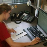 Changes, Changes: Ferris student Courtney Matuszak works at the Office of Housing which recently moved locations to the Helen Ferris lobby. The Telecommunication Services will now be located in the old housing office in the Rankin Center. Photo By: Kate Dupon | Photo Editor