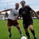 Rough Start: Bri Borgman, senior forward, battles with an opponet during a 2010 season game. The Bulldogs lost their first two games of the 2011 season. Torch File Photo
