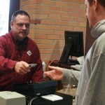Acts of Kindness: Marty Osterholzer, cashier at the Rock Cafe, is the recipent of support from Ferris staff, students and community members. Money was raised to purchase a scooter that was given to Osterholzer. Photo By: Kate Dupon | Photo Editor