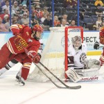 Wrapping Around: FSU sophomore forward Andy Huff attempts a wraparound shot on Union goaltender Troy Grosenick while Bulldog captain defensemen Tommy Hill anticipates for a rebound during the NCAA National Semifinals against Union College. Ferris State would go on to win 3-1 over the Dutchmen and moves on to play Boston College on Saturday. Photo By: Brock Copus | Multimedia Editor