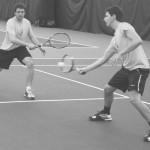 It Takes Two: Bulldogs Tyler Marengo and Sergiu Laza (left to right) work together during a doubles match against Grand Valley State. The duo would defeat the pair of Lakers 8-5. Photo By: Eric Trandel | Photographer